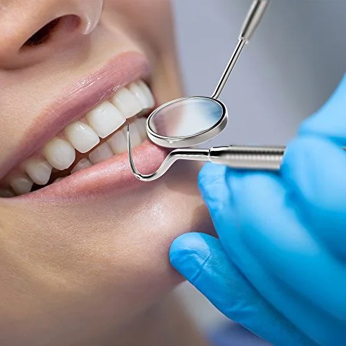 Cosmetic dentistry examination at Mohan's Dentistry